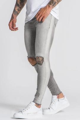 VAQUERO GRIS CON ROTOS CON EFECTO DEGRADÉ