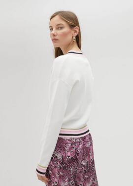 JERSEY ESCOTE PICO CON DETALLE DE COLOR CRUDO